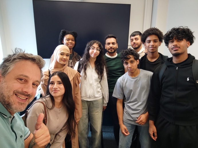 Dr Christos Tapeinos and the Electro-Med Lab team with Year 12 students from the In2STEM 2026 Summer School programme